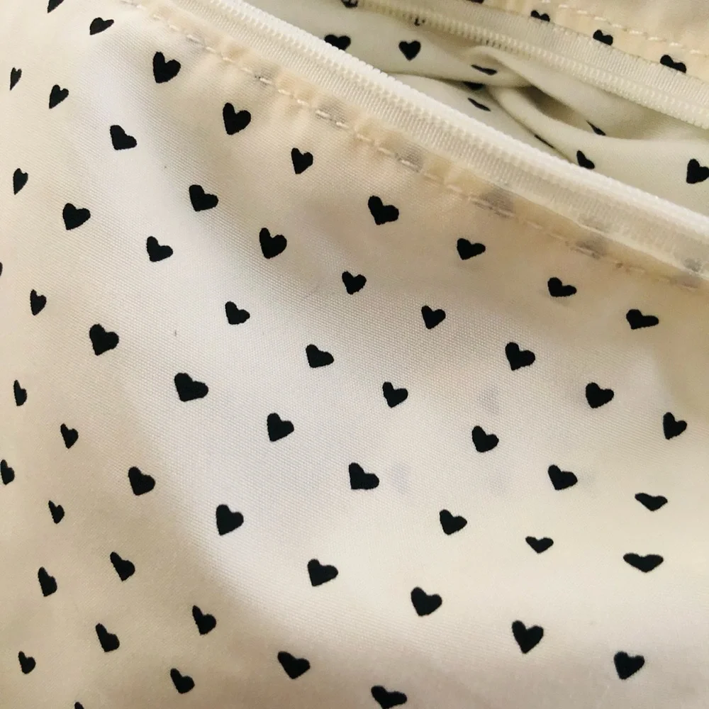 BRIGHTON Collectors*CROSSBODY w/LOVE & JOY BOW design and black tassel NWOT.